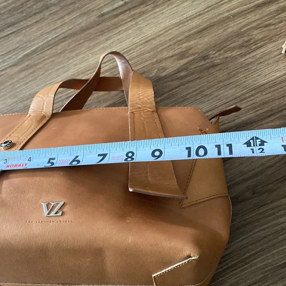 New with tags inside Leather Velez Columbia satchel w/crossbody strap Camel